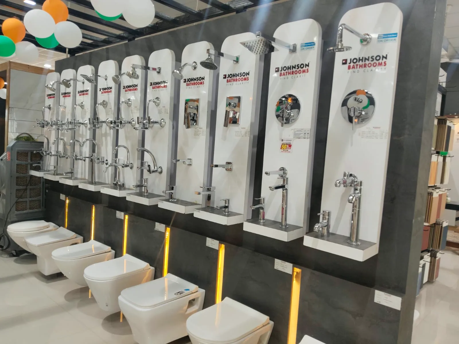 Johnson Bathrooms faucet, mixer and shower display wall